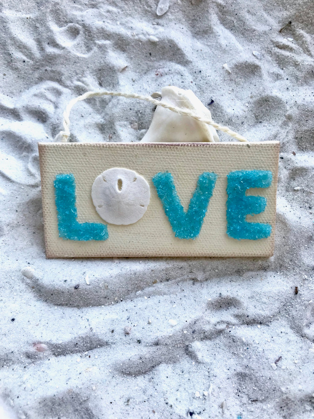 Love Sign Made with Aqua Crushed Glass & Sand Dollar "O"